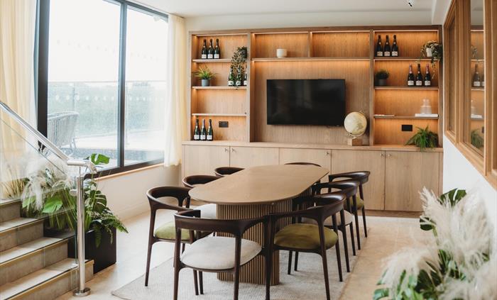 The Writers Room is a private first-floor meeting space with a TV and access to a private balcony. Ideal for intimate meetings. Screen and projector h